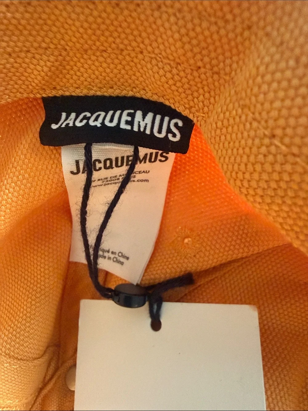 Jacquemus Orange Cap with Pink Logo Graphic